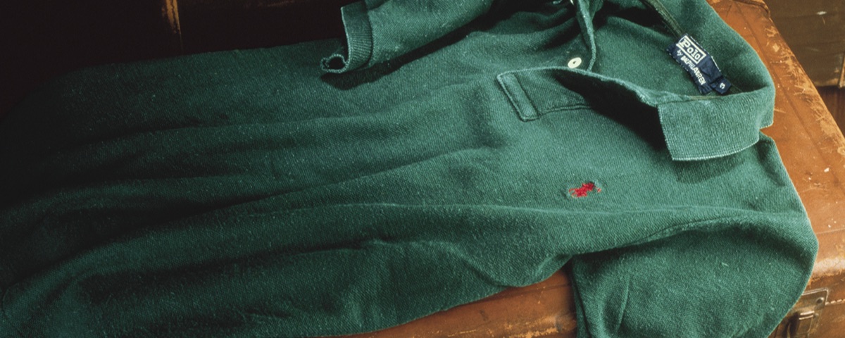 Faded green Polo shirt with red Polo Pony draped over trunk