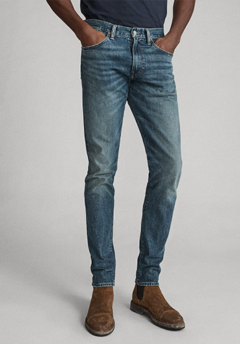 Photograph of man from waist down wearing Polo skinny jeans